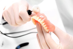 Dental,,A,Dental,Prosthesis,Polishes,.artificial,Teeth,,Prosthetics.prosthetics,Hands,While